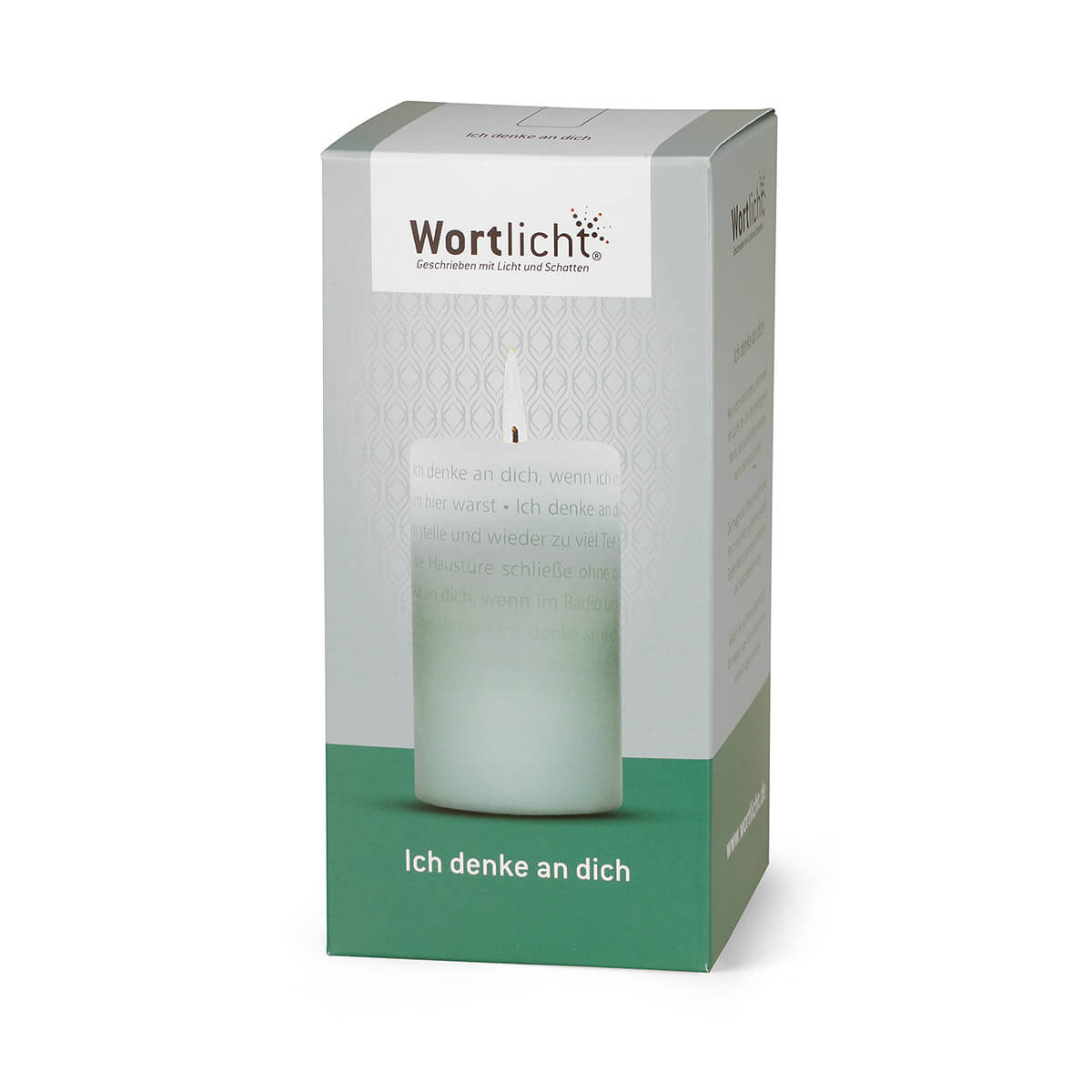 White candle with the text ‘I’m thinking of you’ in a printed box. The box bears the brand name ‘ Wortlicht ’ and features an image of the candle burning. The text on the candle and box is in German, all set against a neutral background.